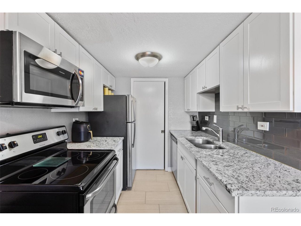 Pearl St, Denver, CO 80203