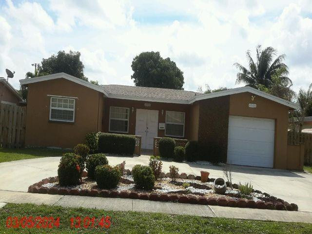 39th St, Lauderdale Lakes, FL 33319