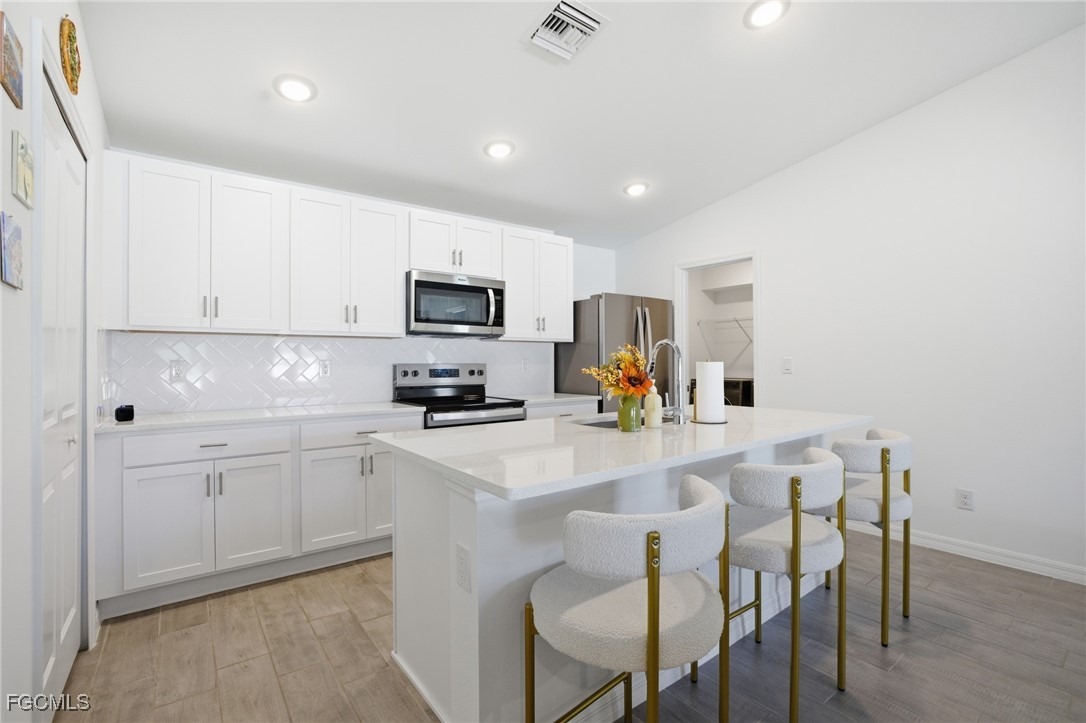 27th Pl, Cape Coral, FL 33993 #1