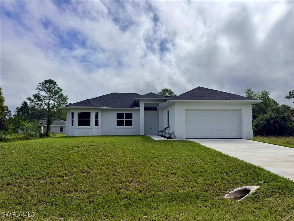 Harry Thayer Ave, Lehigh Acres, FL 33974